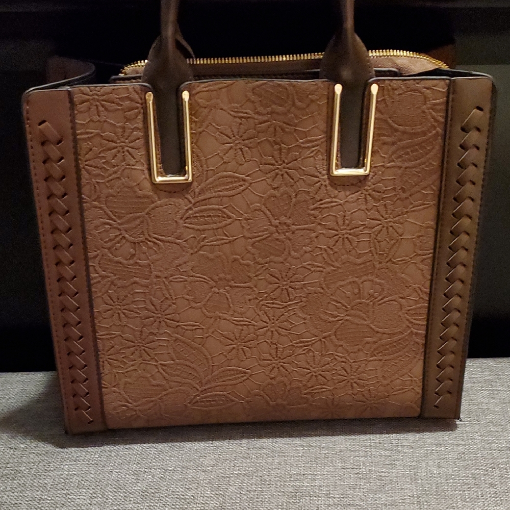 Elegant Brown Handbag with Floral Design